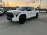 2023 White Toyota Tundra TRD PRO CrewMax 4WD Hybrid (5TFPC5DB2PX) with an 3.4L V6 DOHC 24V HYBRID engine, 6A transmission, located at 1687 Business 35 S, New Braunfels, TX, 78130, (830) 625-7159, 29.655487, -98.051491 - Photo#0