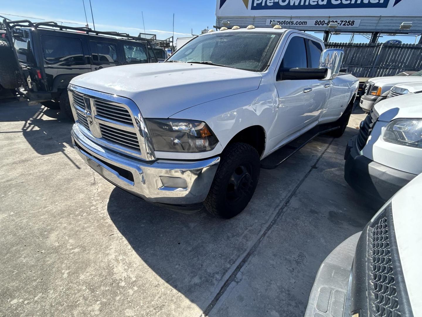 2012 White Dodge Ram 3500 Laramie Crew Cab LWB 4WD DRW (3C63DRJL4CG) with an 6.7L L6 OHV 24V TURBO DIESEL engine, 6-Speed Automatic transmission, located at 1687 Business 35 S, New Braunfels, TX, 78130, (830) 625-7159, 29.655487, -98.051491 - Photo#0