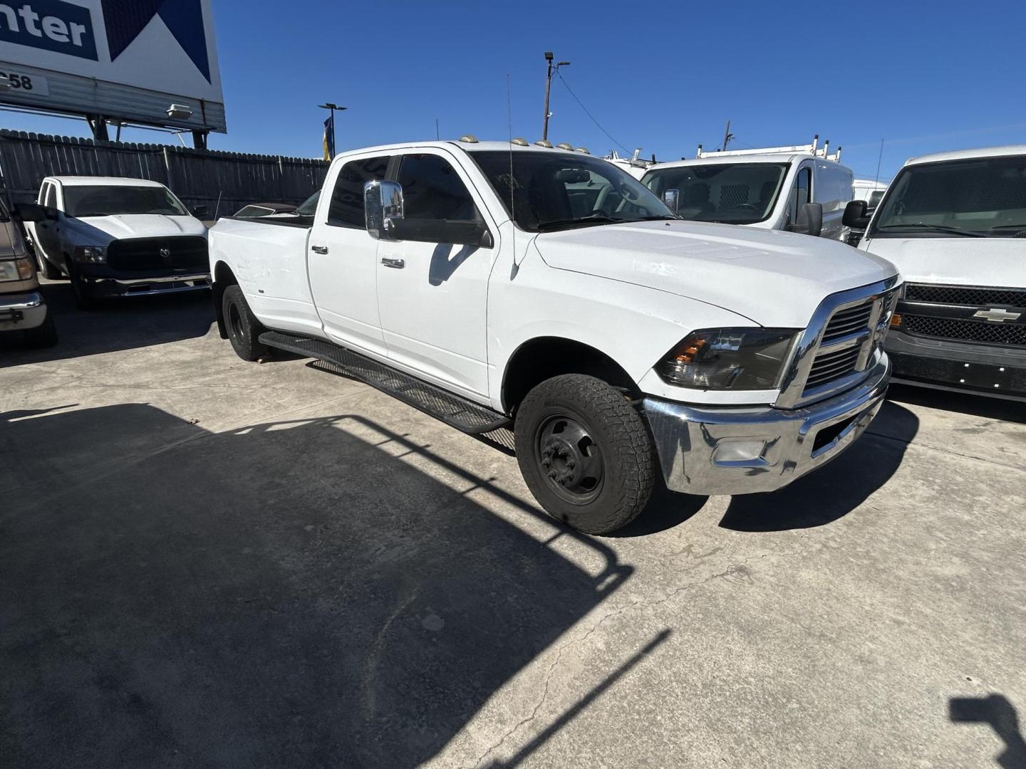 2012 White Dodge Ram 3500 Laramie Crew Cab LWB 4WD DRW (3C63DRJL4CG) with an 6.7L L6 OHV 24V TURBO DIESEL engine, 6-Speed Automatic transmission, located at 1687 Business 35 S, New Braunfels, TX, 78130, (830) 625-7159, 29.655487, -98.051491 - Photo#1