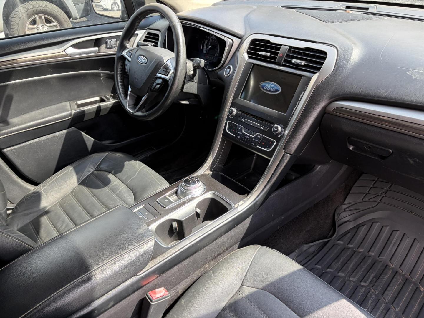 2018 Black Ford Fusion Energi SE (3FA6P0PU9JR) with an 2.0L L4 DOHC 16V HYBRID engine, CVT transmission, located at 1687 Business 35 S, New Braunfels, TX, 78130, (830) 625-7159, 29.655487, -98.051491 - Photo#3