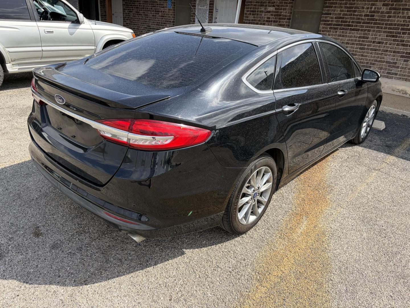 2018 Black Ford Fusion Energi SE (3FA6P0PU9JR) with an 2.0L L4 DOHC 16V HYBRID engine, CVT transmission, located at 1687 Business 35 S, New Braunfels, TX, 78130, (830) 625-7159, 29.655487, -98.051491 - Photo#6