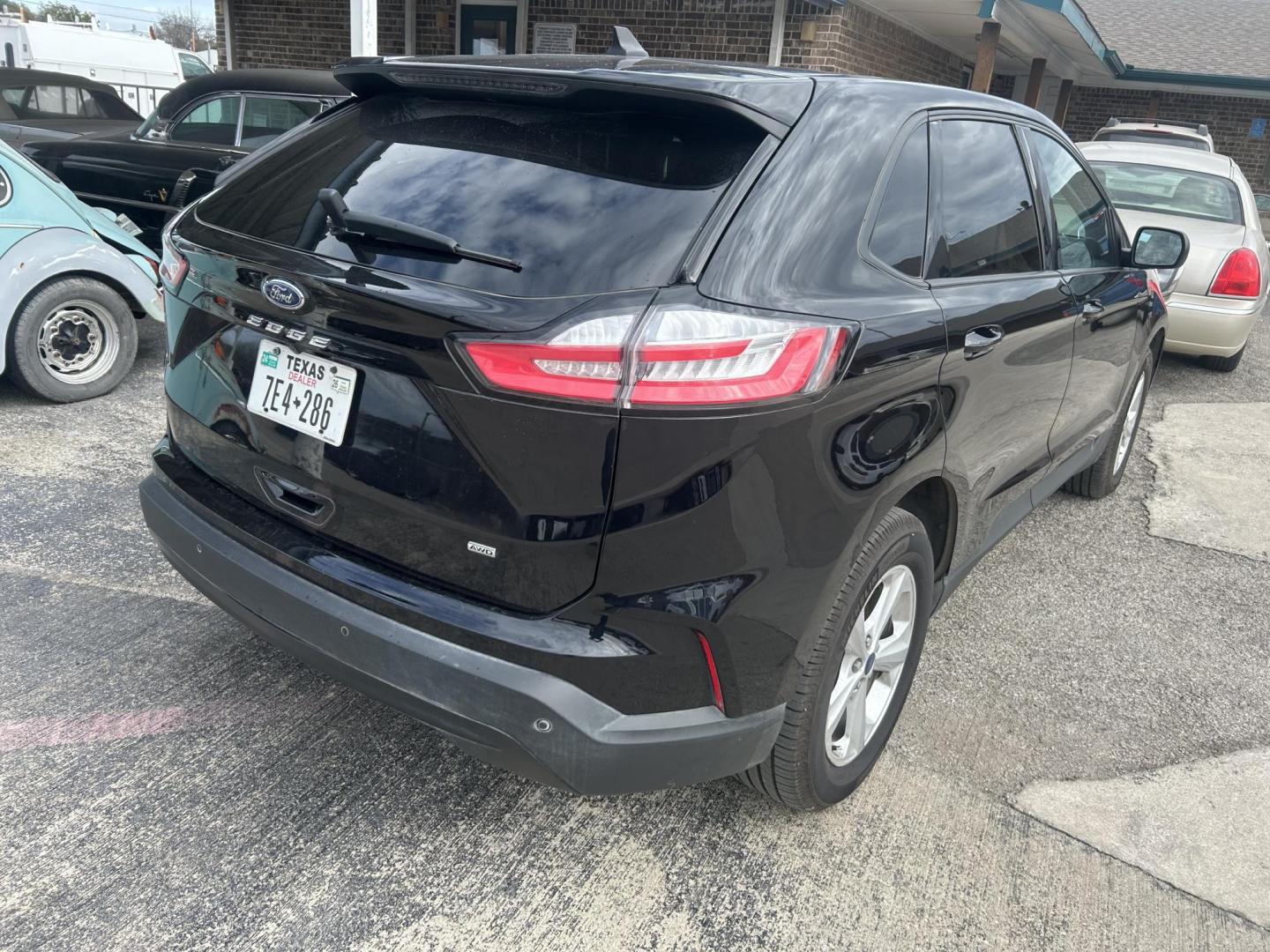 2021 Black Ford Edge SE AWD (2FMPK4G94MB) with an 2.0L L4 DOHC 16V engine, 6A transmission, located at 1687 Business 35 S, New Braunfels, TX, 78130, (830) 625-7159, 29.655487, -98.051491 - Photo#6