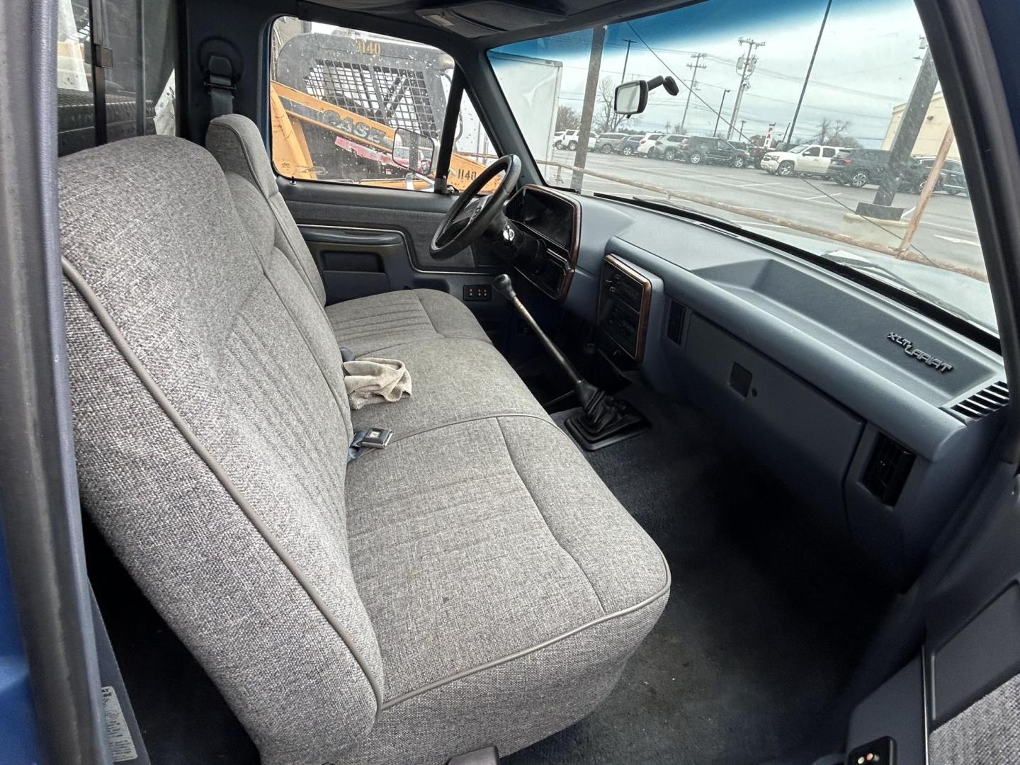 1991 Blue Ford F-150 Reg. Cab Long Bed 4WD (2FTEF14N1MC) with an 5.0L V8 OHV 16V engine, 4-Speed Automatic Overdrive transmission, located at 1687 Business 35 S, New Braunfels, TX, 78130, (830) 625-7159, 29.655487, -98.051491 - Photo#2