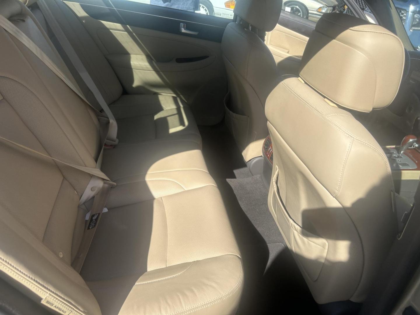 2012 Tan Hyundai Genesis 3.8L (KMHGC4DD0CU) with an 3.8L V6 DOHC 24V engine, 6-Speed Automatic transmission, located at 1687 Business 35 S, New Braunfels, TX, 78130, (830) 625-7159, 29.655487, -98.051491 - Photo#4