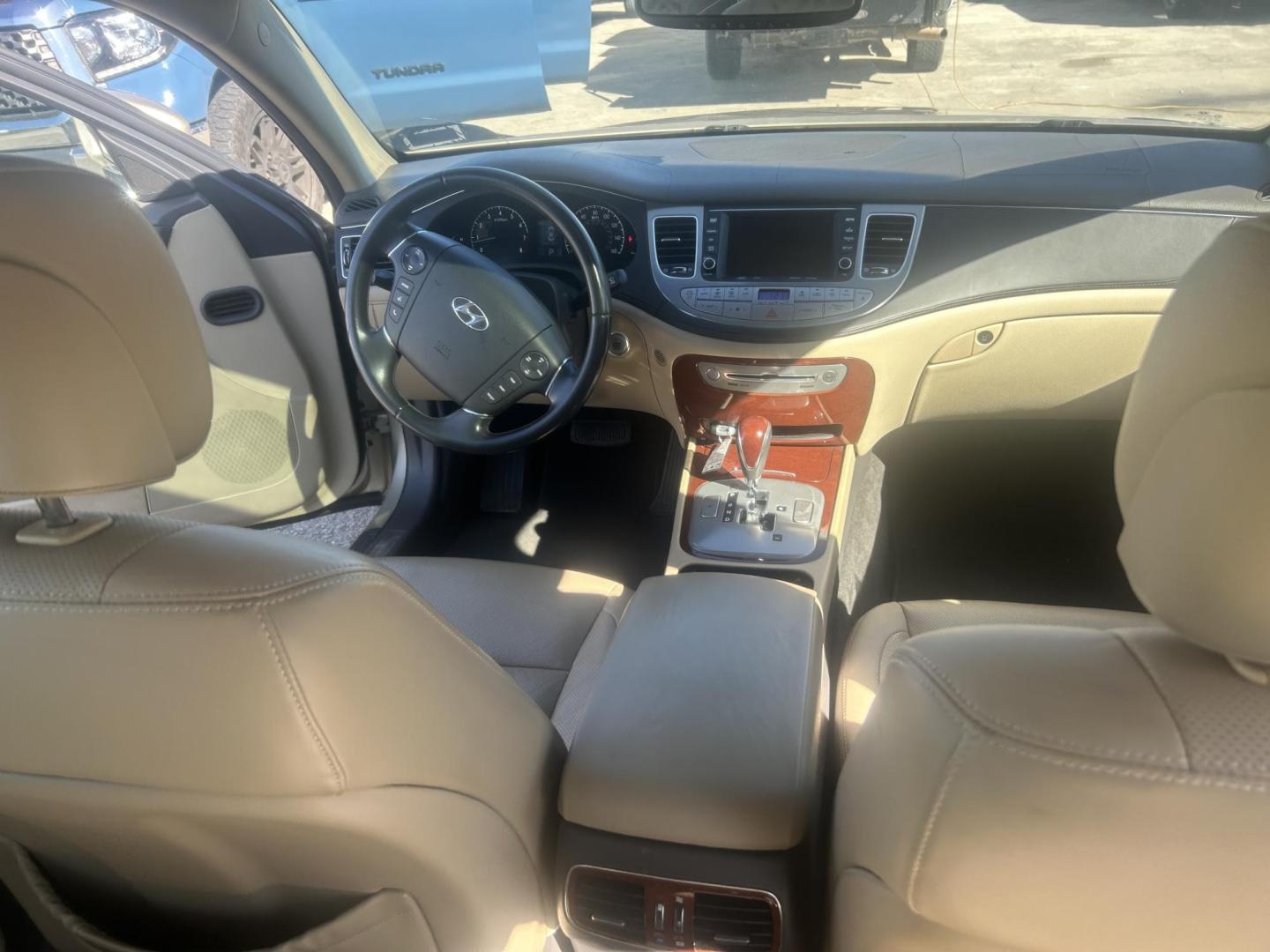 2012 Tan Hyundai Genesis 3.8L (KMHGC4DD0CU) with an 3.8L V6 DOHC 24V engine, 6-Speed Automatic transmission, located at 1687 Business 35 S, New Braunfels, TX, 78130, (830) 625-7159, 29.655487, -98.051491 - Photo#5