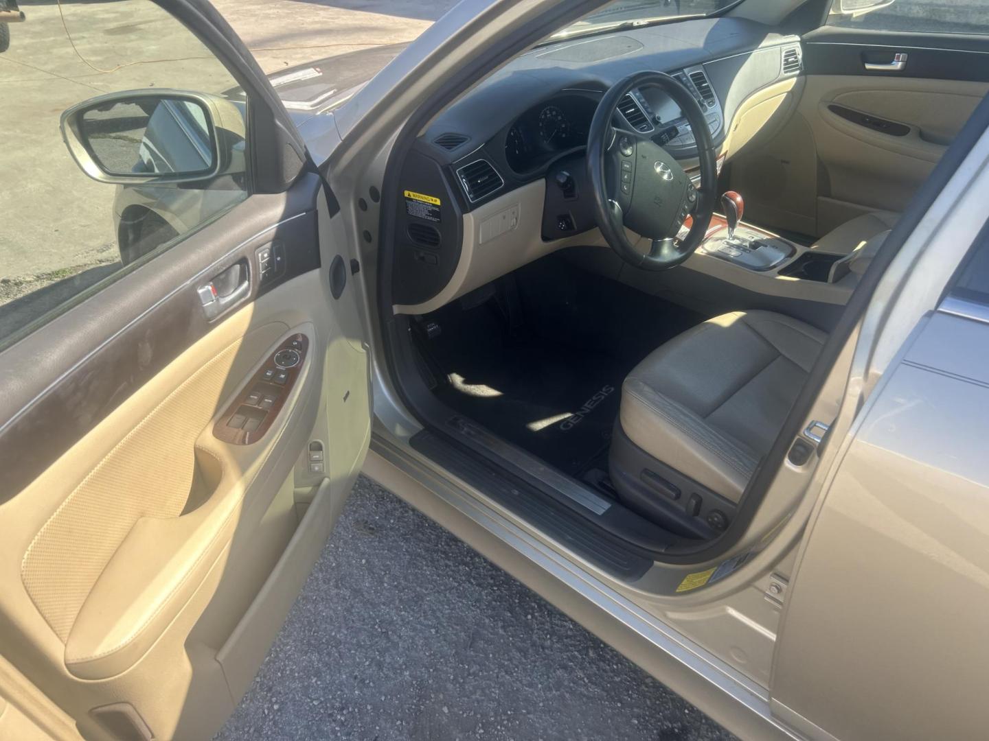 2012 Tan Hyundai Genesis 3.8L (KMHGC4DD0CU) with an 3.8L V6 DOHC 24V engine, 6-Speed Automatic transmission, located at 1687 Business 35 S, New Braunfels, TX, 78130, (830) 625-7159, 29.655487, -98.051491 - Photo#9