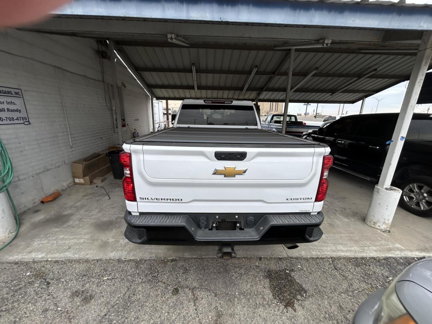 2023 White Chevrolet Silverado 2500HD Custom Crew Cab Short Box 4WD (1GC4YME79PF) with an 6.6L V8 OHV 16V engine, 6A transmission, located at 1687 Business 35 S, New Braunfels, TX, 78130, (830) 625-7159, 29.655487, -98.051491 - Photo#3
