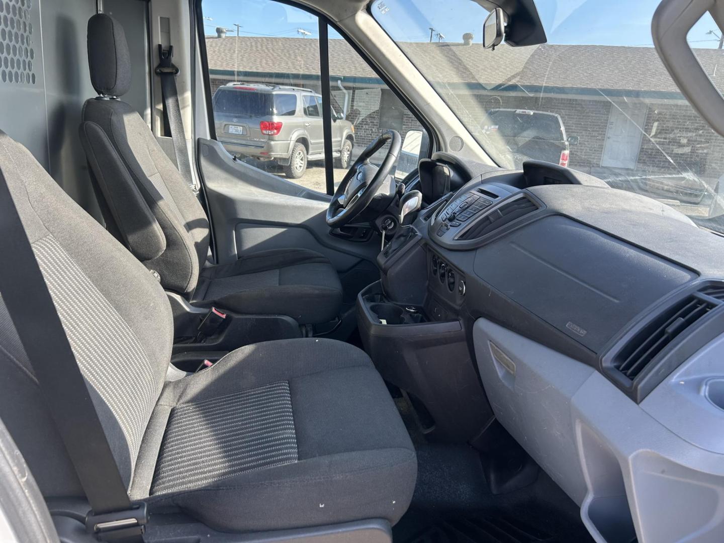 2016 White Ford Transit 250 Van Med. Roof w/Sliding Pass. 148-in. WB (1FTYR2CG0GK) with an 3.5L V6 DOHC 24V engine, 6A transmission, located at 1687 Business 35 S, New Braunfels, TX, 78130, (830) 625-7159, 29.655487, -98.051491 - Photo#2