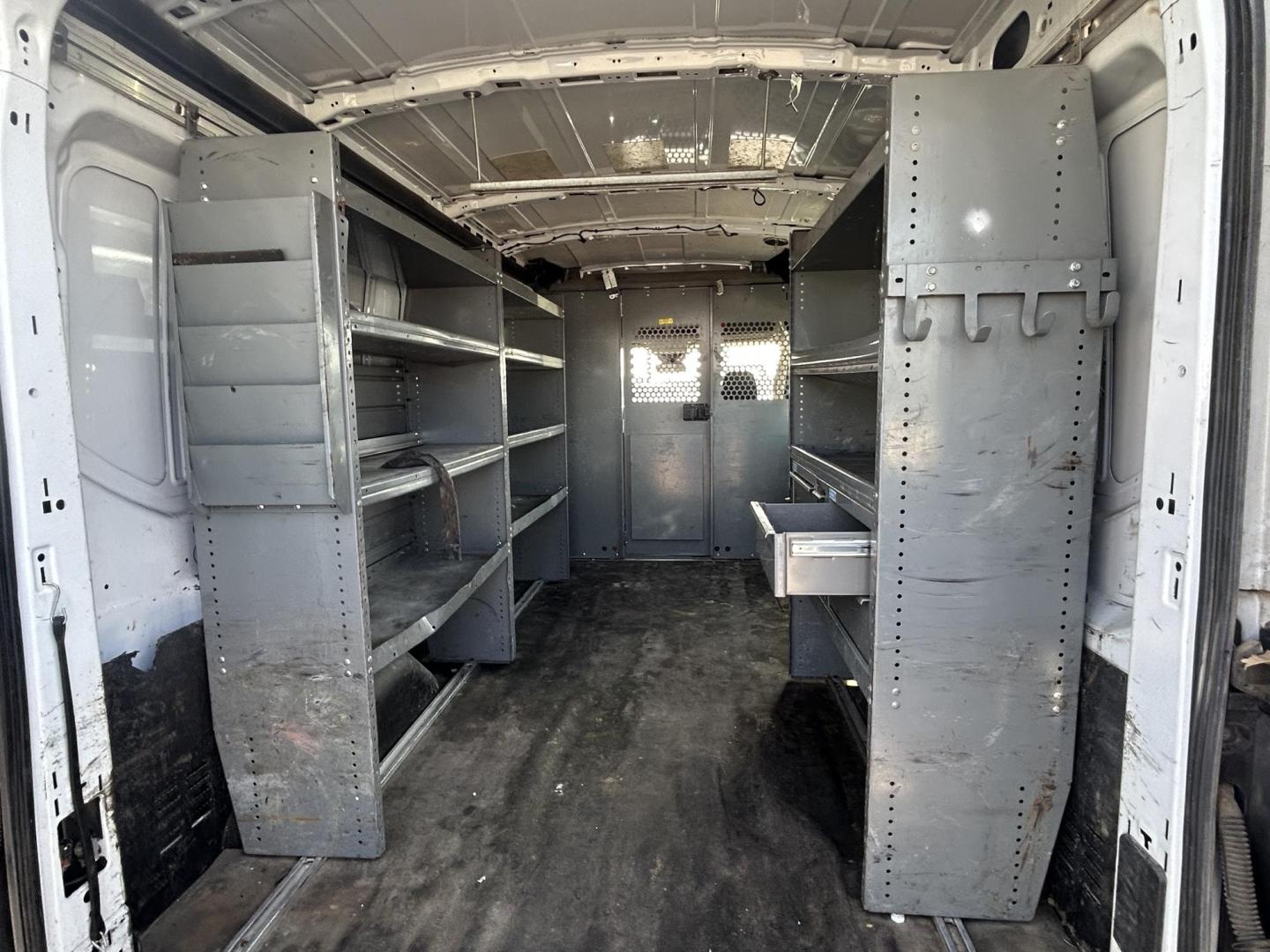 2016 White Ford Transit 250 Van Med. Roof w/Sliding Pass. 148-in. WB (1FTYR2CG0GK) with an 3.5L V6 DOHC 24V engine, 6A transmission, located at 1687 Business 35 S, New Braunfels, TX, 78130, (830) 625-7159, 29.655487, -98.051491 - Photo#6