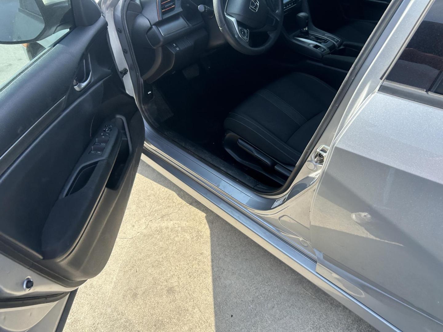 2017 Silver Honda Civic LX CVT (SHHFK7H20HU) with an 2.0L L4 DOHC 16V TURBO engine, CVT transmission, located at 1687 Business 35 S, New Braunfels, TX, 78130, (830) 625-7159, 29.655487, -98.051491 - Photo#9