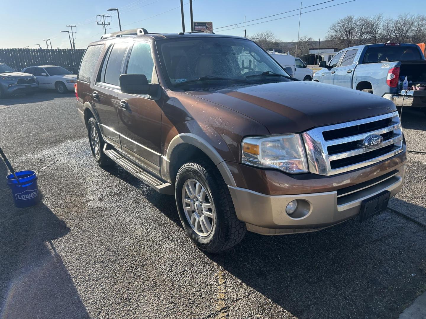 2011 Brown Ford Expedition XLT 2WD (1FMJU1H56BE) with an 5.4L V8 SOHC 16V FFV engine, 6-Speed Automatic transmission, located at 1687 Business 35 S, New Braunfels, TX, 78130, (830) 625-7159, 29.655487, -98.051491 - Photo#1
