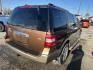 2011 Brown Ford Expedition XLT 2WD (1FMJU1H56BE) with an 5.4L V8 SOHC 16V FFV engine, 6-Speed Automatic transmission, located at 1687 Business 35 S, New Braunfels, TX, 78130, (830) 625-7159, 29.655487, -98.051491 - Photo#6