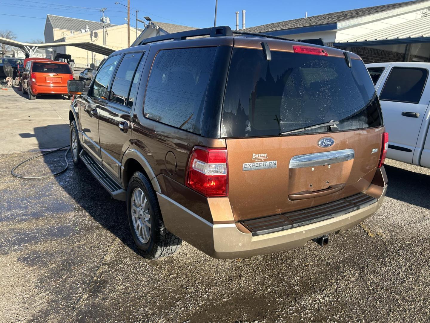 2011 Brown Ford Expedition XLT 2WD (1FMJU1H56BE) with an 5.4L V8 SOHC 16V FFV engine, 6-Speed Automatic transmission, located at 1687 Business 35 S, New Braunfels, TX, 78130, (830) 625-7159, 29.655487, -98.051491 - Photo#7