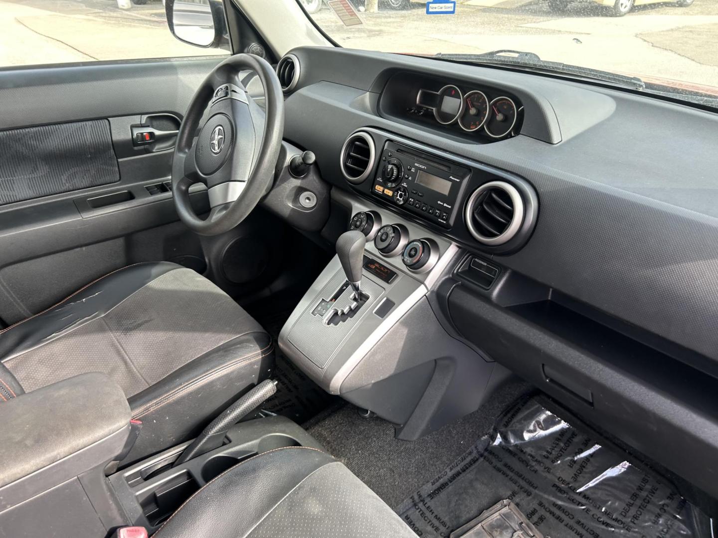 2012 Orange Scion xB 5-Door Wagon 5-Spd MT (JTLZE4FE5CJ) with an 2.4L L4 DOHC 16V engine, 5-Speed Manual transmission, located at 1687 Business 35 S, New Braunfels, TX, 78130, (830) 625-7159, 29.655487, -98.051491 - Photo#3