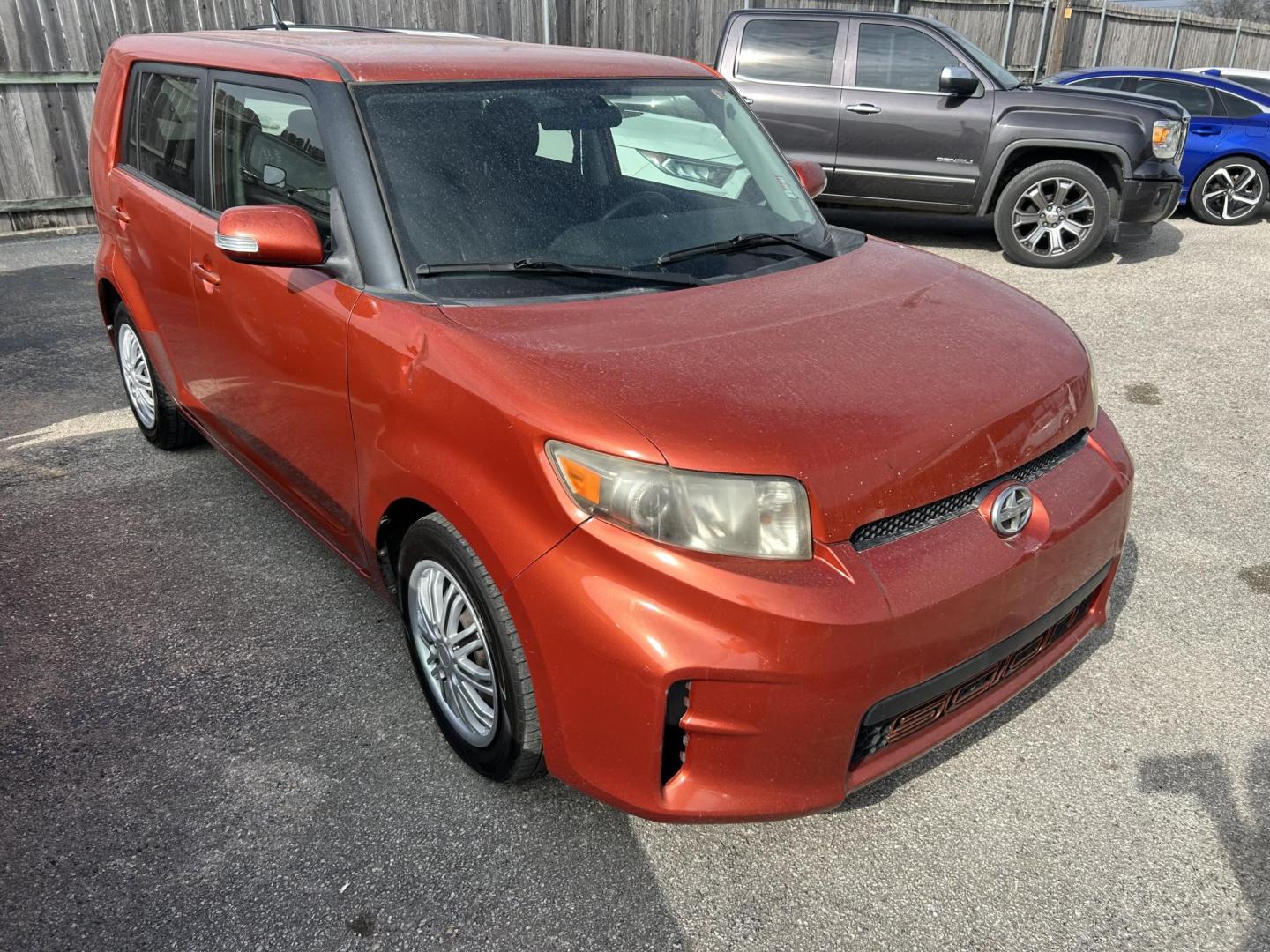 2012 Orange Scion xB 5-Door Wagon 5-Spd MT (JTLZE4FE5CJ) with an 2.4L L4 DOHC 16V engine, 5-Speed Manual transmission, located at 1687 Business 35 S, New Braunfels, TX, 78130, (830) 625-7159, 29.655487, -98.051491 - Photo#1