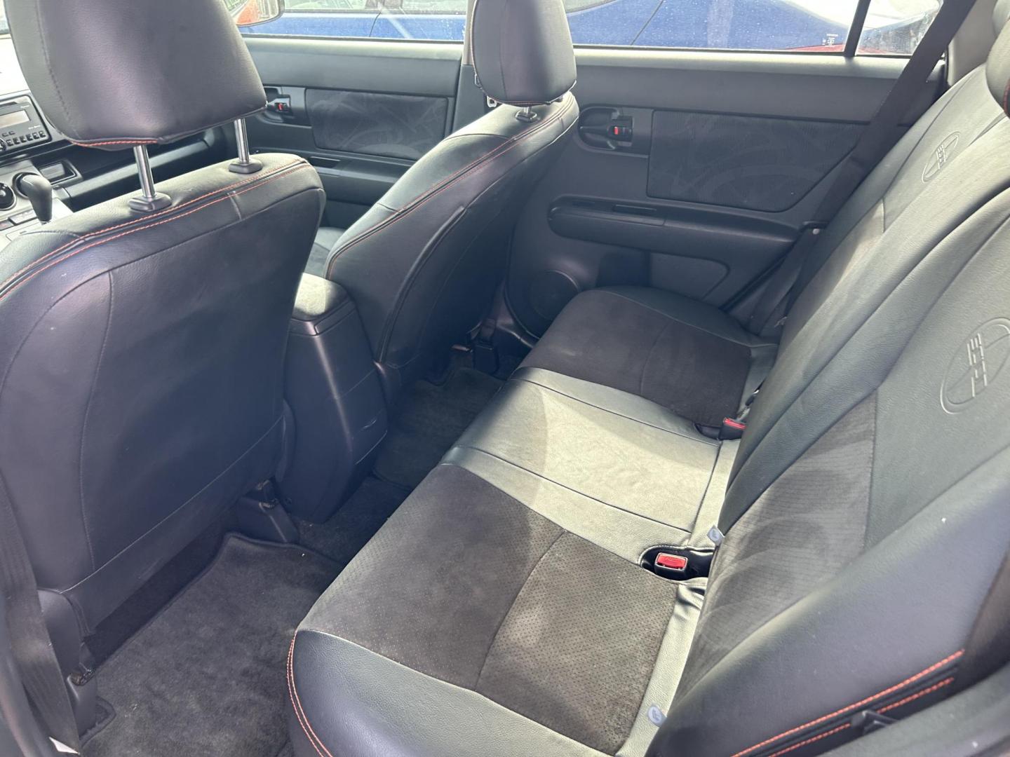 2012 Orange Scion xB 5-Door Wagon 5-Spd MT (JTLZE4FE5CJ) with an 2.4L L4 DOHC 16V engine, 5-Speed Manual transmission, located at 1687 Business 35 S, New Braunfels, TX, 78130, (830) 625-7159, 29.655487, -98.051491 - Photo#8