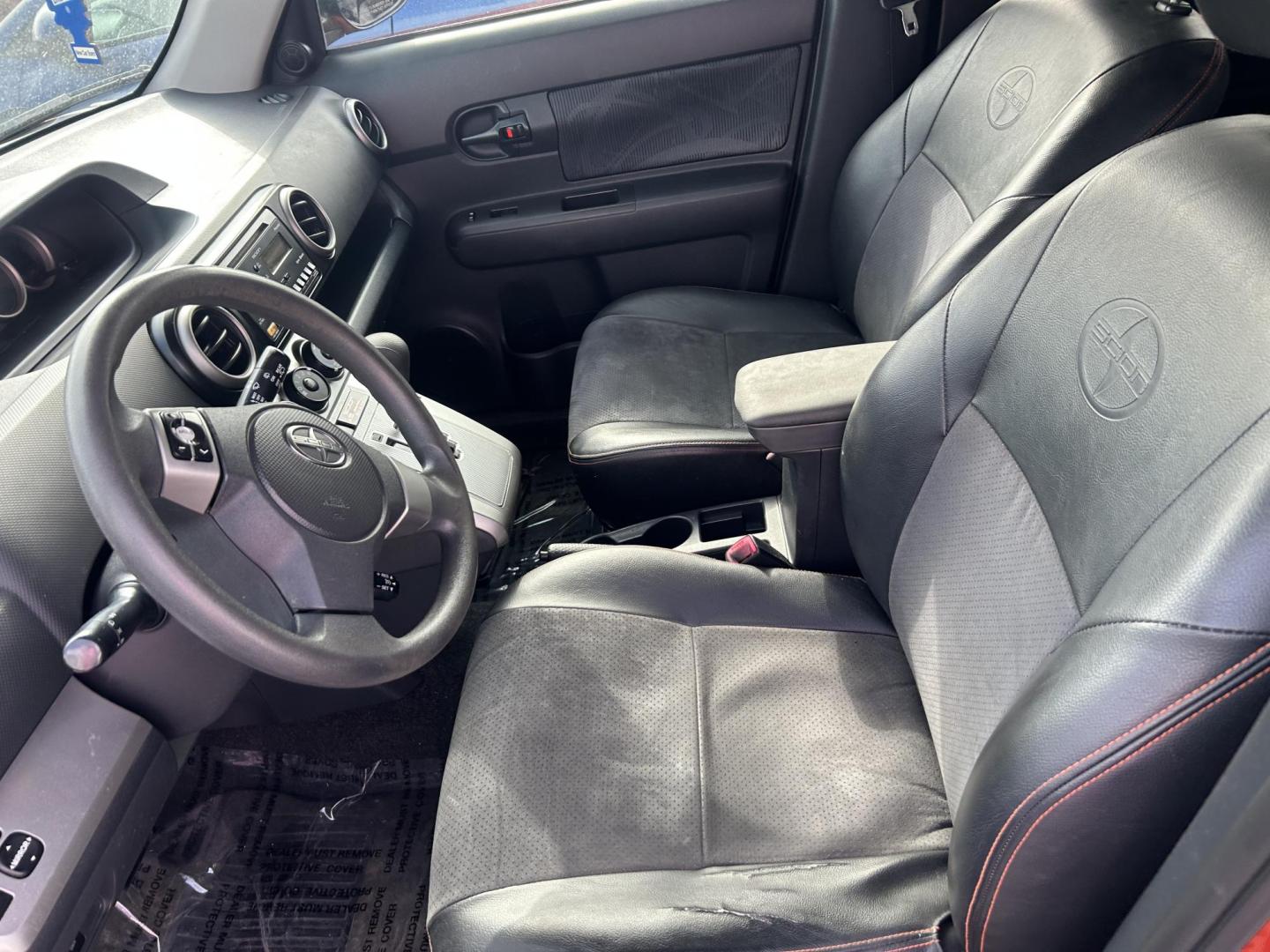 2012 Orange Scion xB 5-Door Wagon 5-Spd MT (JTLZE4FE5CJ) with an 2.4L L4 DOHC 16V engine, 5-Speed Manual transmission, located at 1687 Business 35 S, New Braunfels, TX, 78130, (830) 625-7159, 29.655487, -98.051491 - Photo#10