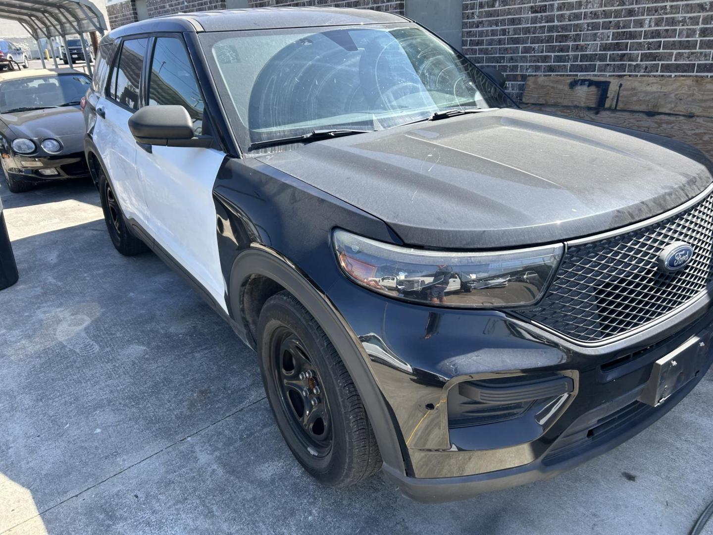 2020 Black Ford Explorer Police 4WD (1FM5K8AB5LG) with an 3.3L V6 DOHC 24V engine, 10A transmission, located at 1687 Business 35 S, New Braunfels, TX, 78130, (830) 625-7159, 29.655487, -98.051491 - Photo#1
