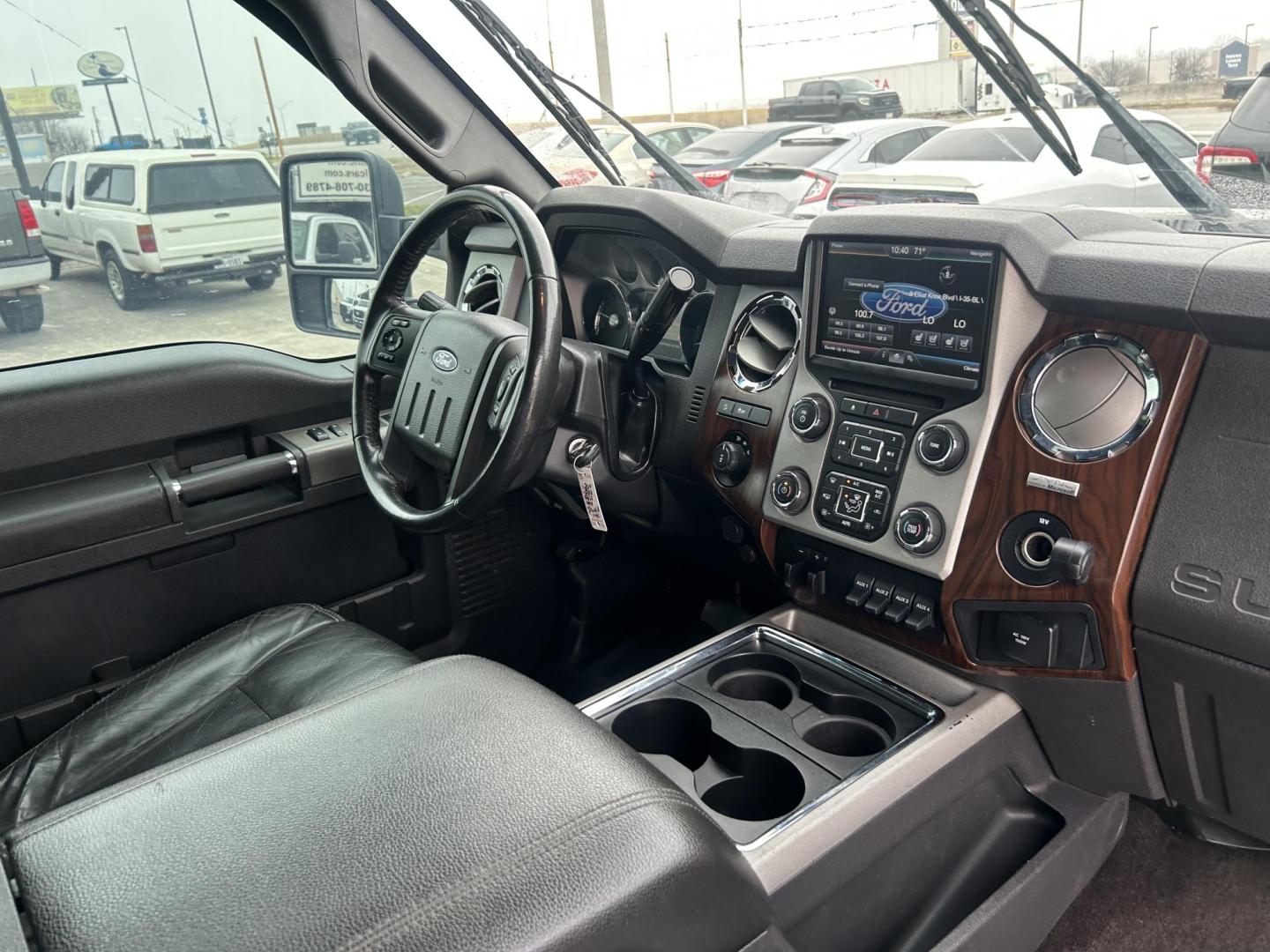 2014 Silver Ford F-250 SD LariatCrew Cab 4WD (1FT7W2BT5EE) with an 6.7L V8 OHV 16V DIESEL engine, 6-Speed Automatic transmission, located at 1687 Business 35 S, New Braunfels, TX, 78130, (830) 625-7159, 29.655487, -98.051491 - Photo#3