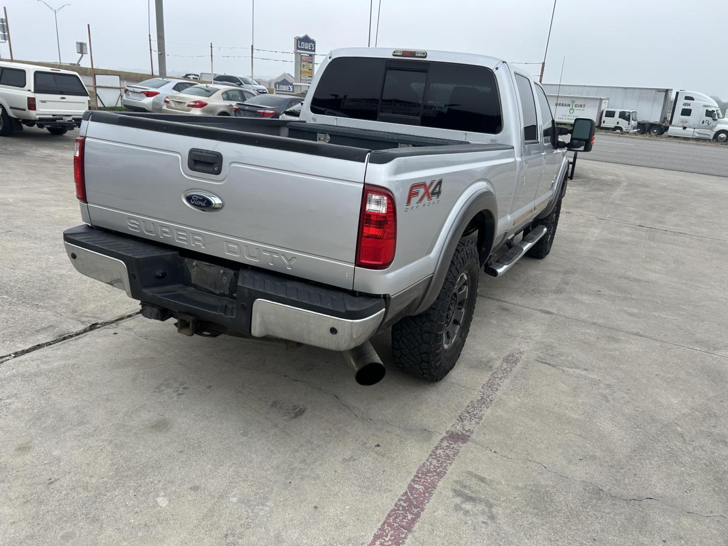 2014 Silver Ford F-250 SD LariatCrew Cab 4WD (1FT7W2BT5EE) with an 6.7L V8 OHV 16V DIESEL engine, 6-Speed Automatic transmission, located at 1687 Business 35 S, New Braunfels, TX, 78130, (830) 625-7159, 29.655487, -98.051491 - Photo#6