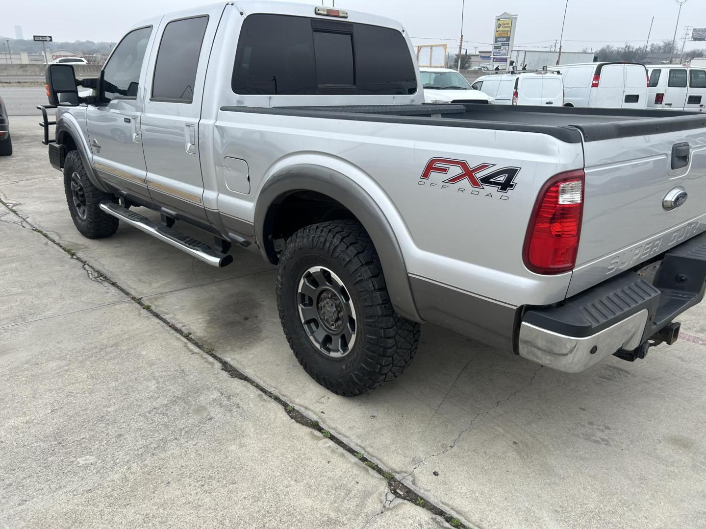 2014 Silver Ford F-250 SD LariatCrew Cab 4WD (1FT7W2BT5EE) with an 6.7L V8 OHV 16V DIESEL engine, 6-Speed Automatic transmission, located at 1687 Business 35 S, New Braunfels, TX, 78130, (830) 625-7159, 29.655487, -98.051491 - Photo#8
