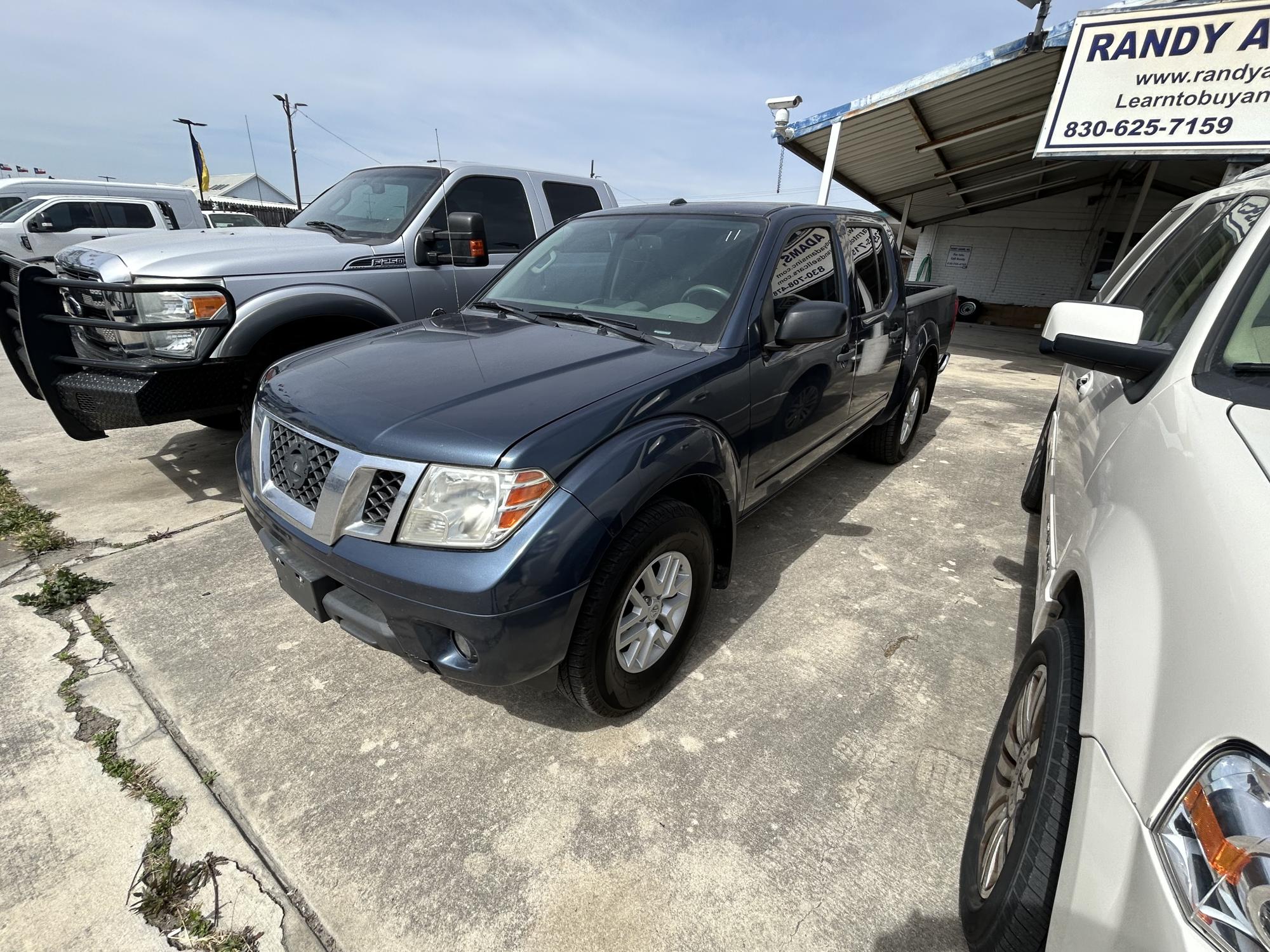 photo of 2016 Nissan Frontier PRO-4X Crew Cab 5AT 4WD