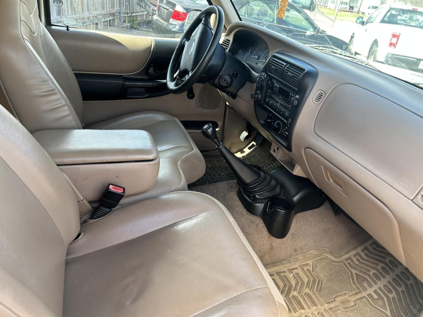 2001 Tan Ford Ranger Edge Plus SuperCab 4.0 4WD (1FTZR15E81P) with an 4.0L V6 SOHC 12V engine, 5-Speed Manual Overdrive transmission, located at 1687 Business 35 S, New Braunfels, TX, 78130, (830) 625-7159, 29.655487, -98.051491 - Photo#2