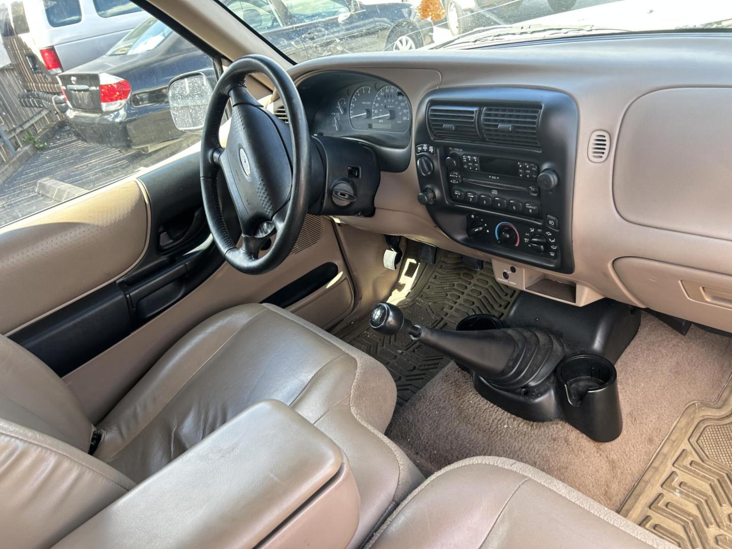 2001 Tan Ford Ranger Edge Plus SuperCab 4.0 4WD (1FTZR15E81P) with an 4.0L V6 SOHC 12V engine, 5-Speed Manual Overdrive transmission, located at 1687 Business 35 S, New Braunfels, TX, 78130, (830) 625-7159, 29.655487, -98.051491 - Photo#3