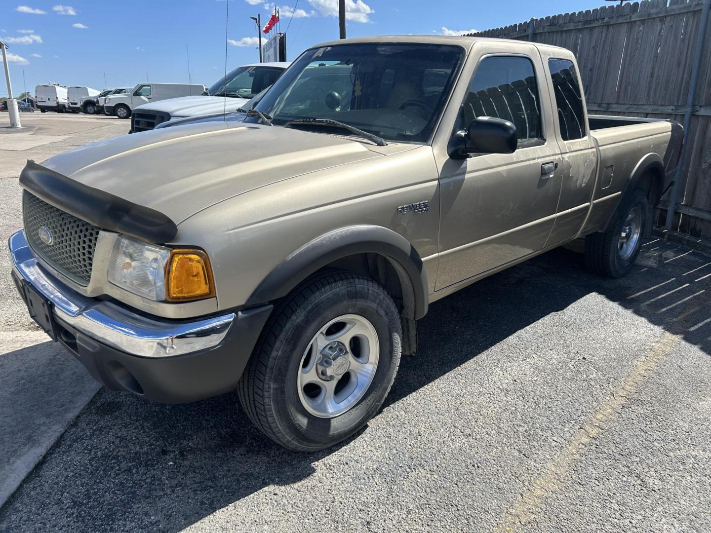 2001 Tan Ford Ranger Edge Plus SuperCab 4.0 4WD (1FTZR15E81P) with an 4.0L V6 SOHC 12V engine, 5-Speed Manual Overdrive transmission, located at 1687 Business 35 S, New Braunfels, TX, 78130, (830) 625-7159, 29.655487, -98.051491 - Photo#0