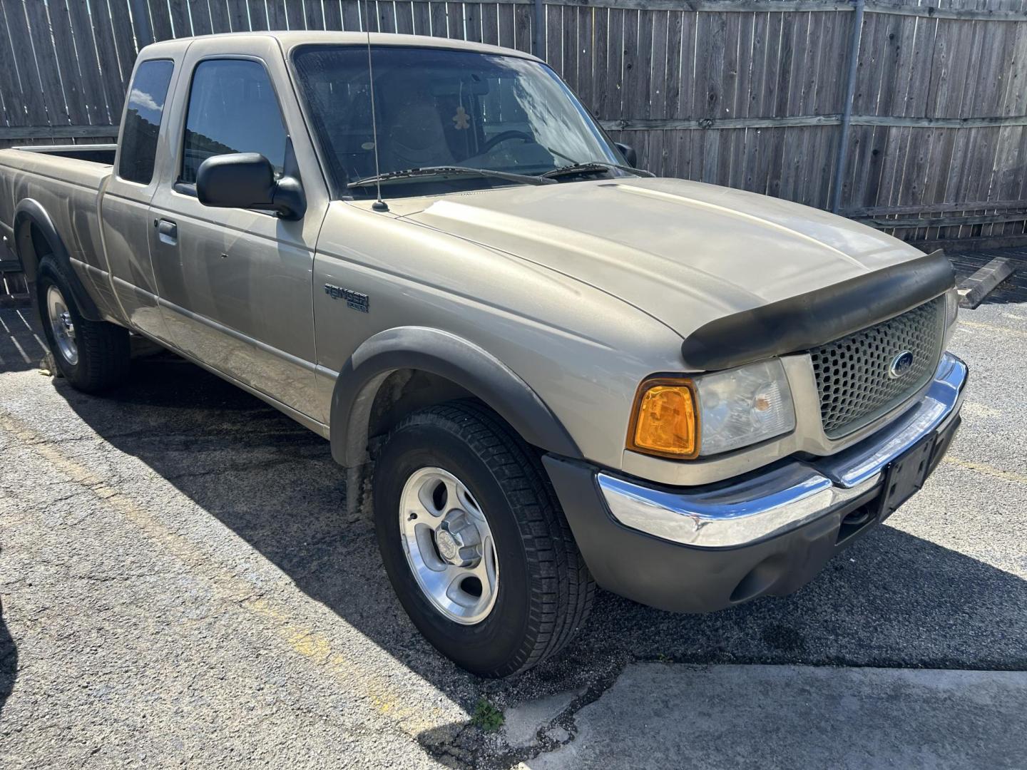 2001 Tan Ford Ranger Edge Plus SuperCab 4.0 4WD (1FTZR15E81P) with an 4.0L V6 SOHC 12V engine, 5-Speed Manual Overdrive transmission, located at 1687 Business 35 S, New Braunfels, TX, 78130, (830) 625-7159, 29.655487, -98.051491 - Photo#1