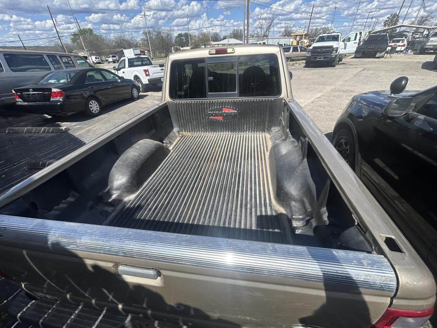 2001 Tan Ford Ranger Edge Plus SuperCab 4.0 4WD (1FTZR15E81P) with an 4.0L V6 SOHC 12V engine, 5-Speed Manual Overdrive transmission, located at 1687 Business 35 S, New Braunfels, TX, 78130, (830) 625-7159, 29.655487, -98.051491 - Photo#5
