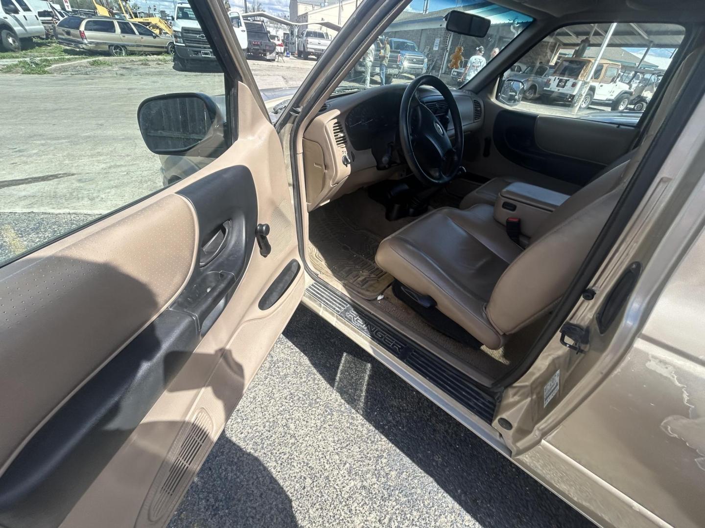 2001 Tan Ford Ranger Edge Plus SuperCab 4.0 4WD (1FTZR15E81P) with an 4.0L V6 SOHC 12V engine, 5-Speed Manual Overdrive transmission, located at 1687 Business 35 S, New Braunfels, TX, 78130, (830) 625-7159, 29.655487, -98.051491 - Photo#7