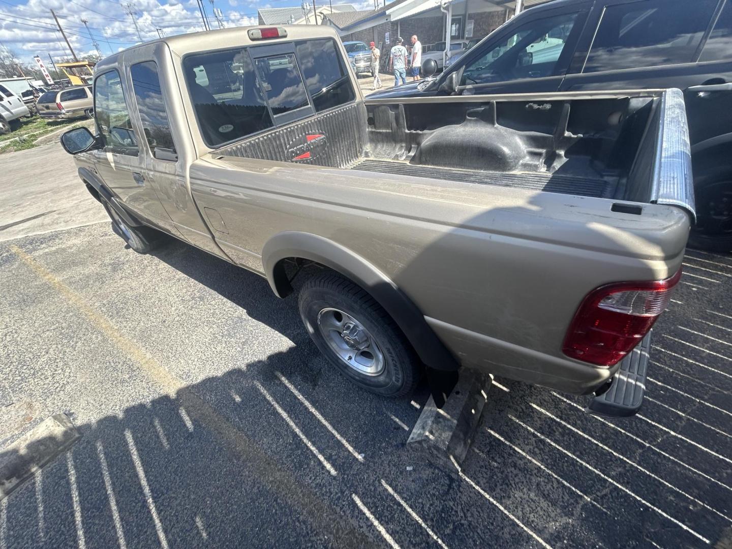 2001 Tan Ford Ranger Edge Plus SuperCab 4.0 4WD (1FTZR15E81P) with an 4.0L V6 SOHC 12V engine, 5-Speed Manual Overdrive transmission, located at 1687 Business 35 S, New Braunfels, TX, 78130, (830) 625-7159, 29.655487, -98.051491 - Photo#6