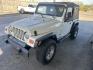 2002 White Jeep Wrangler X (1J4FA39S82P) with an 4.0L L6 OHV 12V engine, located at 1687 Business 35 S, New Braunfels, TX, 78130, (830) 625-7159, 29.655487, -98.051491 - Photo#0