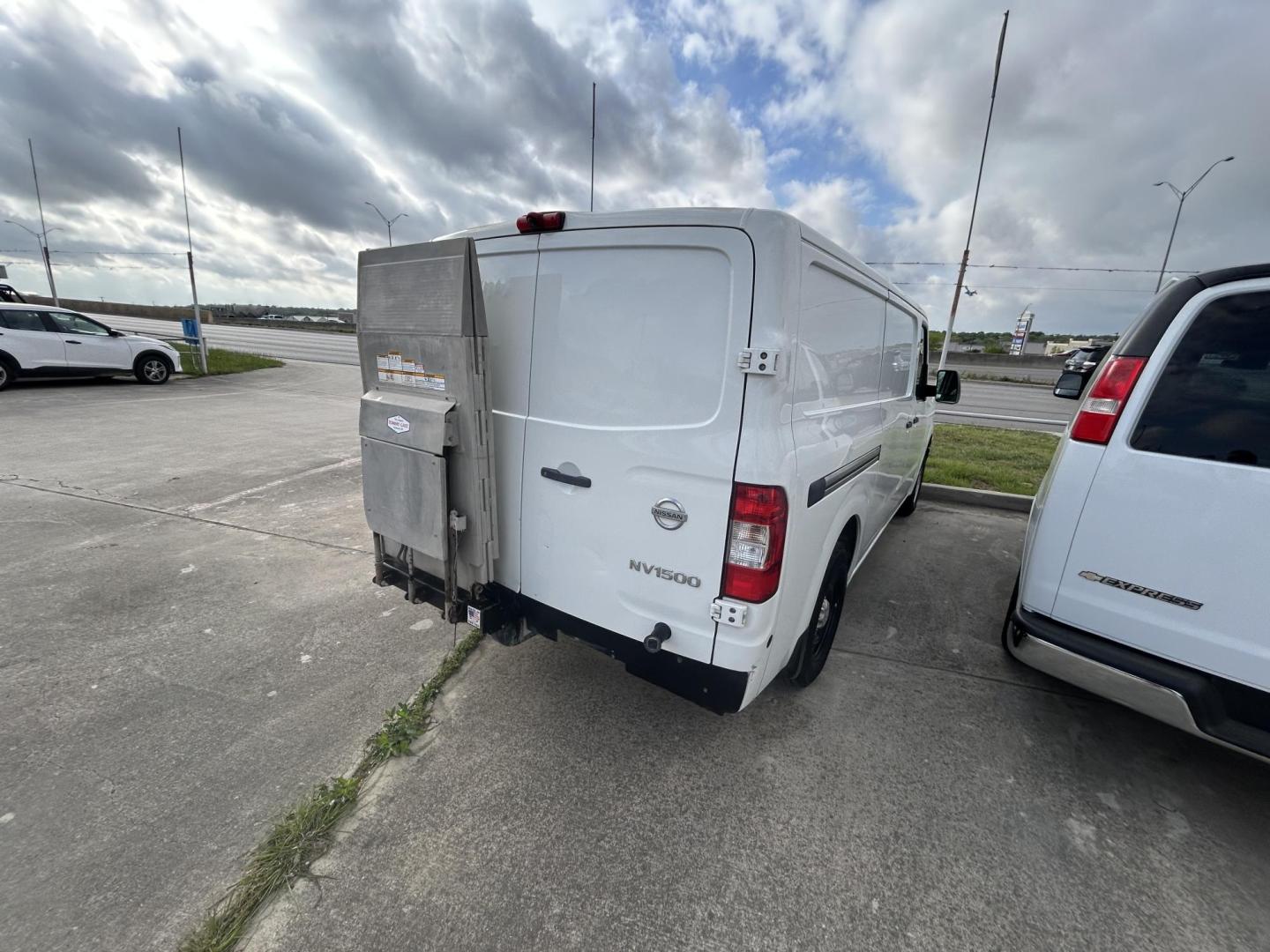 2017 White Nissan NV Cargo 1500 SV (1N6BF0KM7HN) with an 4.0L V6 engine, 5A transmission, located at 1687 Business 35 S, New Braunfels, TX, 78130, (830) 625-7159, 29.655487, -98.051491 - Photo#6