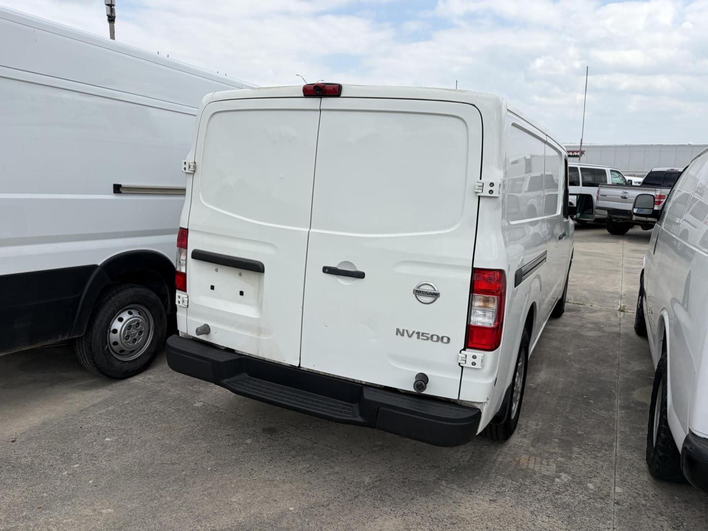 2017 White Nissan NV Cargo 1500 SV (1N6BF0KM7HN) with an 4.0L V6 engine, 5A transmission, located at 1687 Business 35 S, New Braunfels, TX, 78130, (830) 625-7159, 29.655487, -98.051491 - Photo#2
