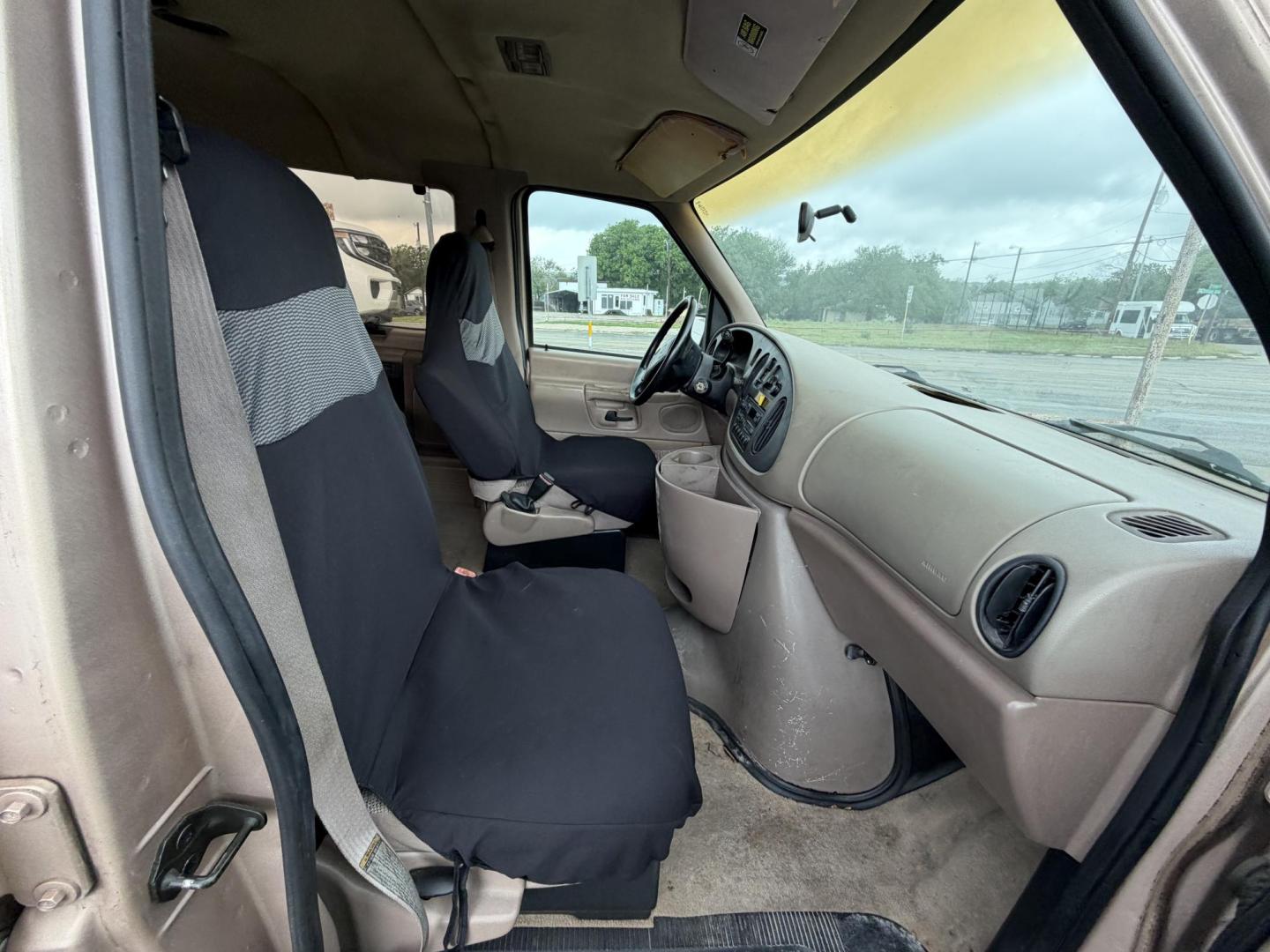 1997 Ford Club Wagon XL Super (1FBJS31S1VH) with an 6.8L V10 SOHC 20V engine, 4-Speed Automatic Overdrive transmission, located at 1687 Business 35 S, New Braunfels, TX, 78130, (830) 625-7159, 29.655487, -98.051491 - Photo#2