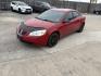 2006 Red Pontiac G6 V6 Sedan (1G2ZG558164) with an 3.5L V6 OHV 12V engine, 4-Speed Automatic Overdrive transmission, located at 1687 Business 35 S, New Braunfels, TX, 78130, (830) 625-7159, 29.655487, -98.051491 - Photo#0
