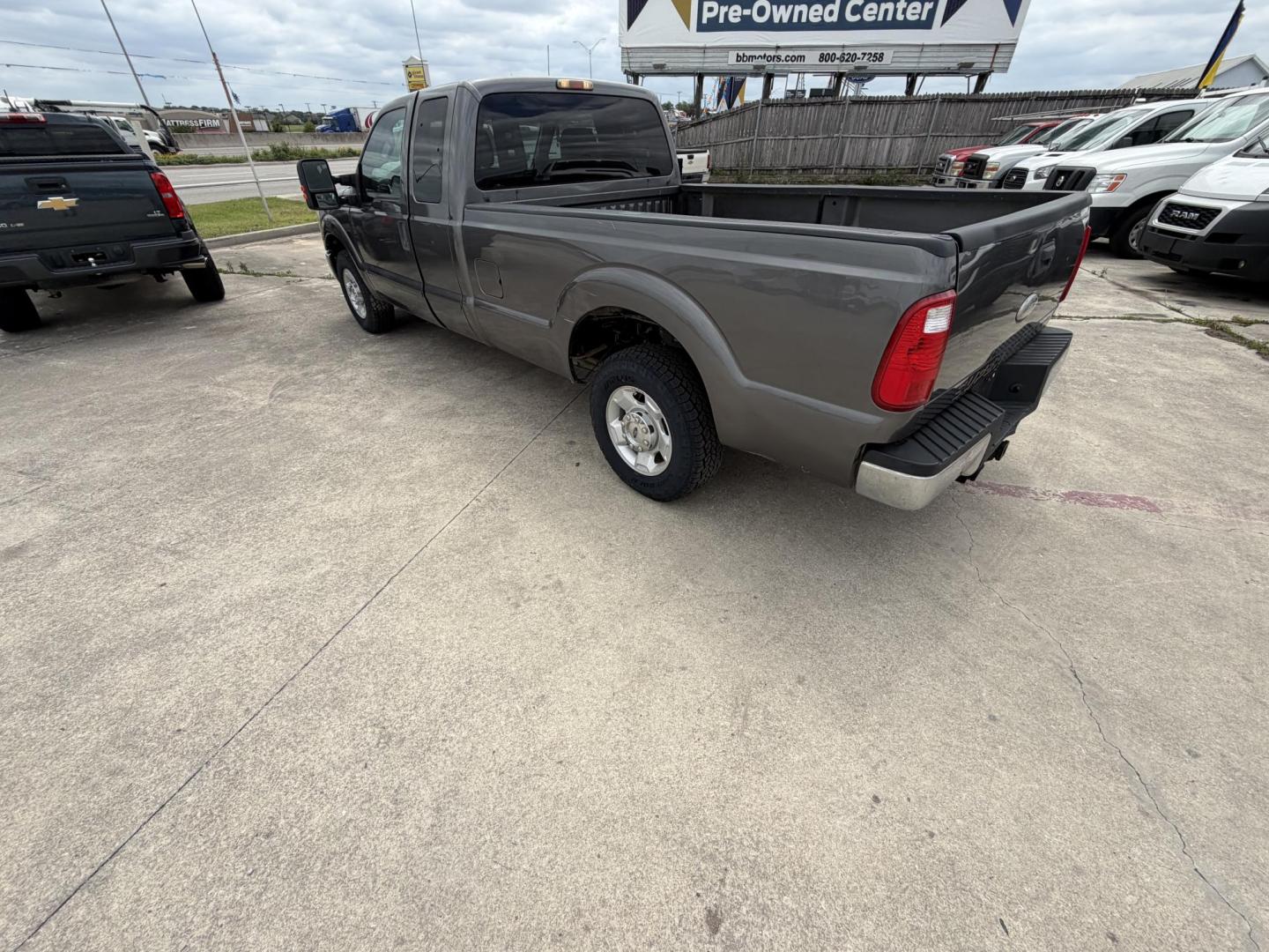 2012 Gray Ford F-250 SD Lariat SuperCab 2WD (1FT7X2A6XCE) with an 6.2L V8 OHV 16V engine, 6-Speed Automatic transmission, located at 1687 Business 35 S, New Braunfels, TX, 78130, (830) 625-7159, 29.655487, -98.051491 - Photo#7