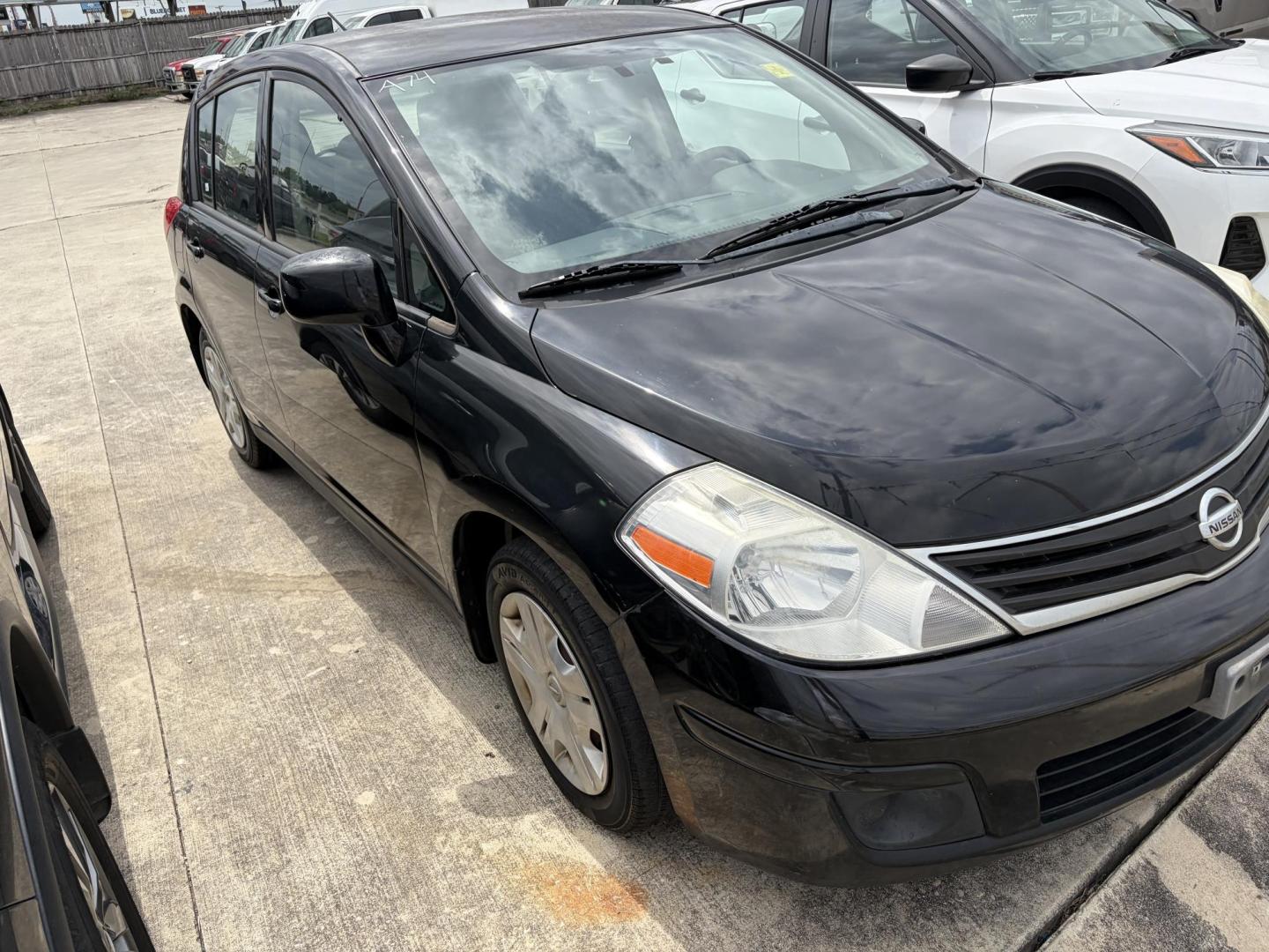 2011 Black Nissan Versa 1.8 S Hatchback (3N1BC1CP1BL) with an 1.8L L4 DOHC 16V engine, located at 1687 Business 35 S, New Braunfels, TX, 78130, (830) 625-7159, 29.655487, -98.051491 - Photo#1