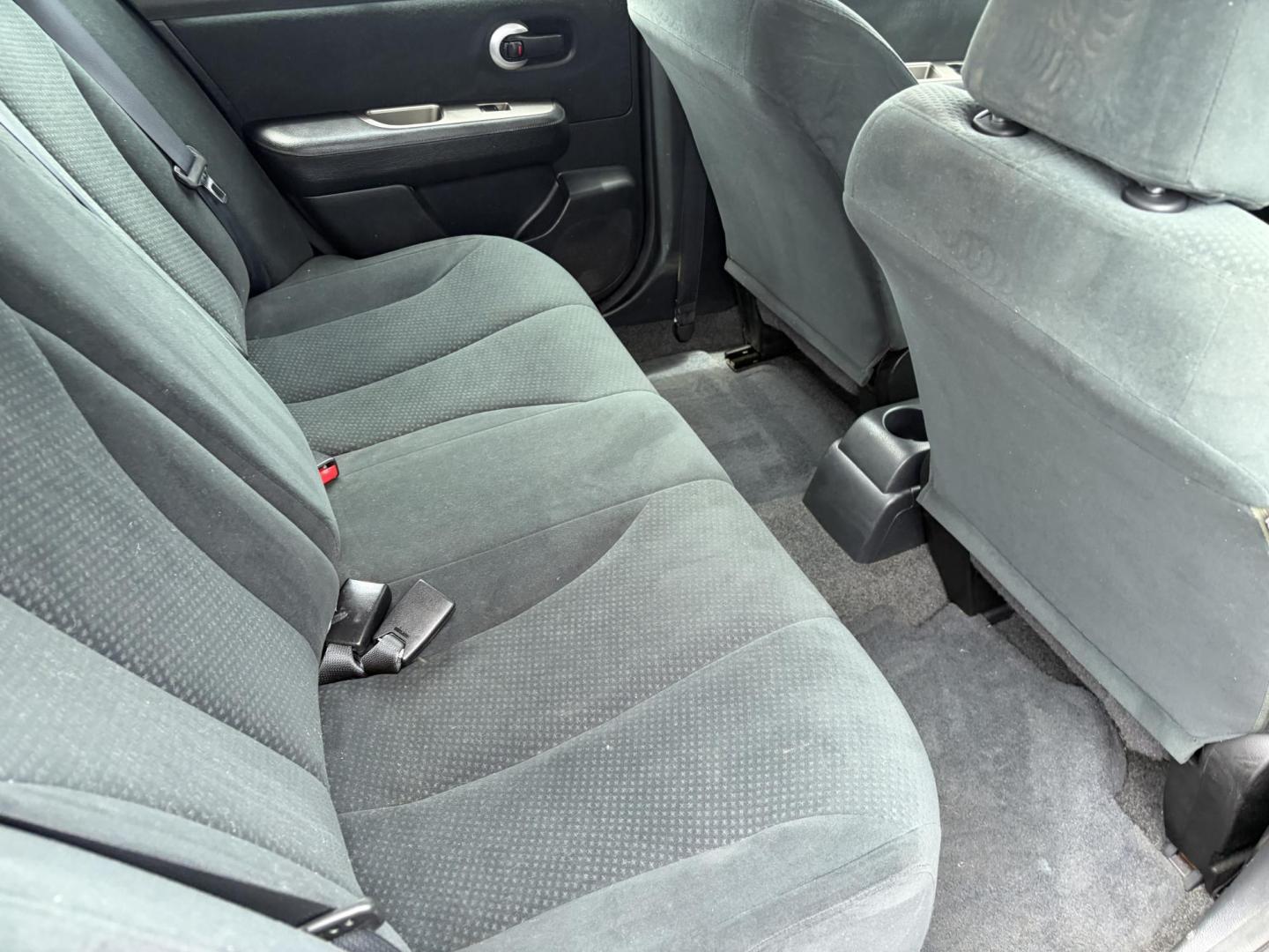 2011 Black Nissan Versa 1.8 S Hatchback (3N1BC1CP1BL) with an 1.8L L4 DOHC 16V engine, located at 1687 Business 35 S, New Braunfels, TX, 78130, (830) 625-7159, 29.655487, -98.051491 - Photo#4