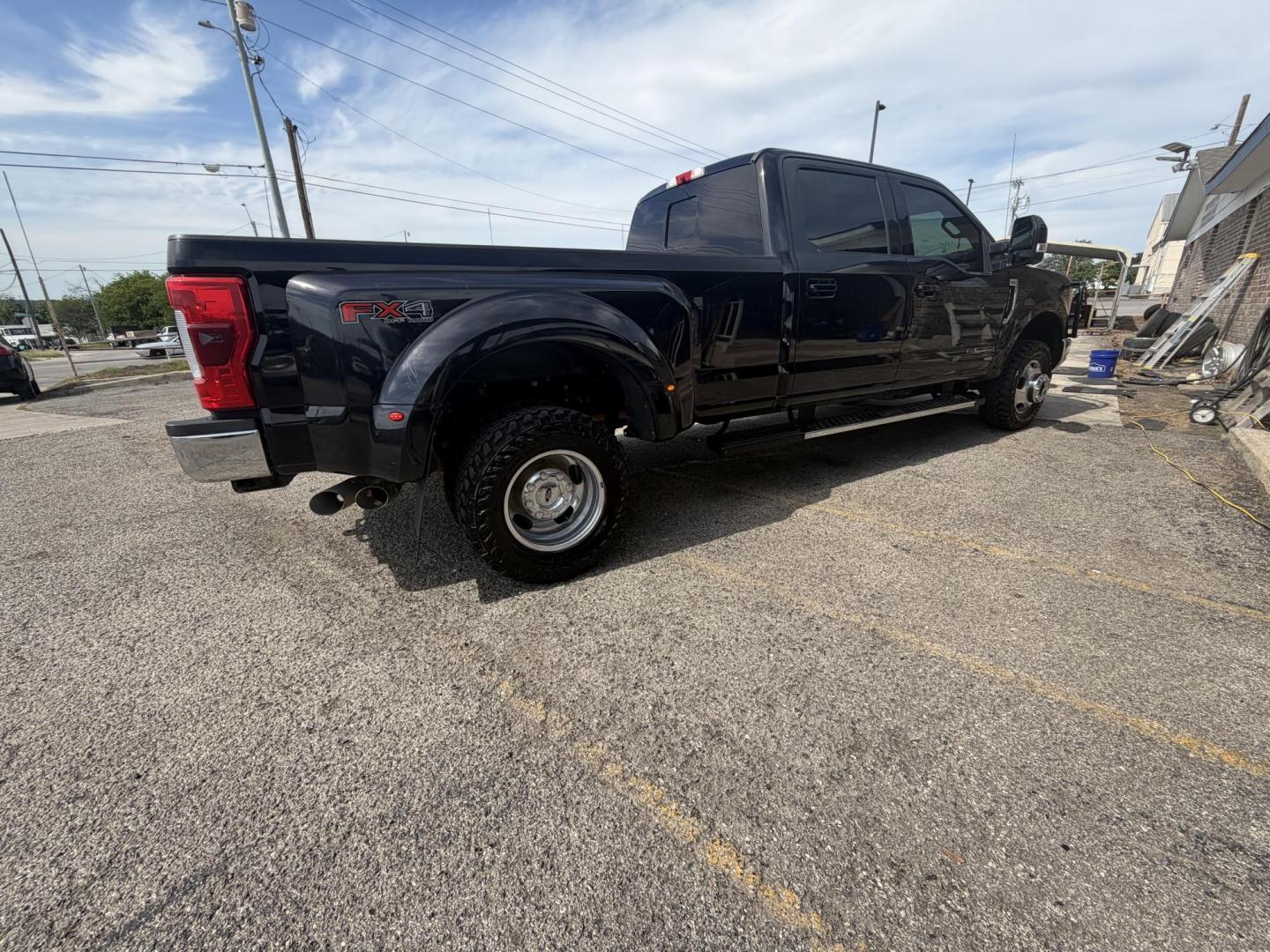 2017 Black Ford F-350 SD Lariat Crew Cab Long Bed DRW 4WD (1FT8W3DT5HE) with an 6.7L V8 OHV 16V DIESEL engine, 6A transmission, located at 1687 Business 35 S, New Braunfels, TX, 78130, (830) 625-7159, 29.655487, -98.051491 - Photo#6