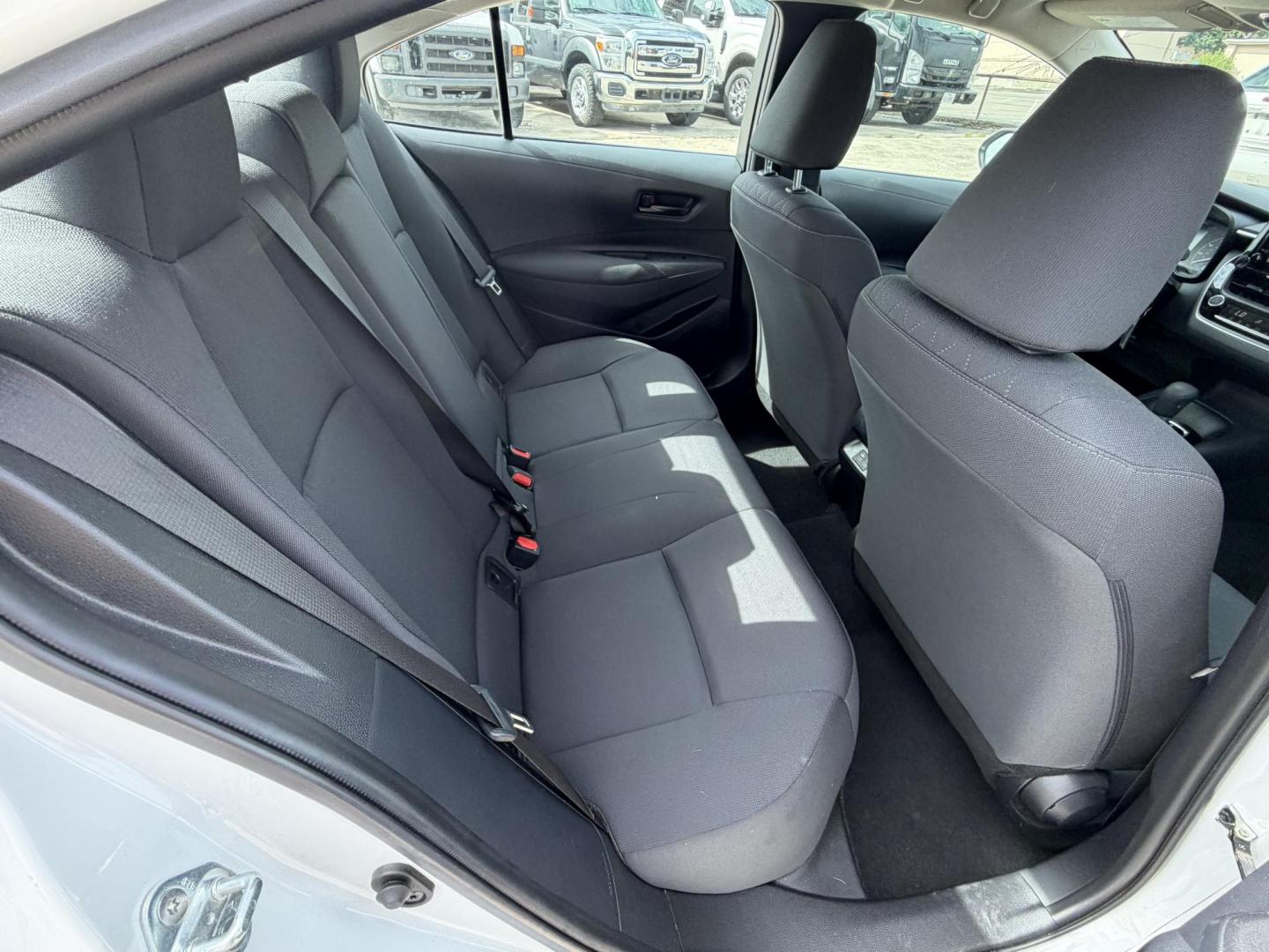 2024 White Toyota Corolla LE (5YFB4MDE8RP) with an 2.0L L4 DOHC 16V engine, CVT transmission, located at 1687 Business 35 S, New Braunfels, TX, 78130, (830) 625-7159, 29.655487, -98.051491 - Photo#4