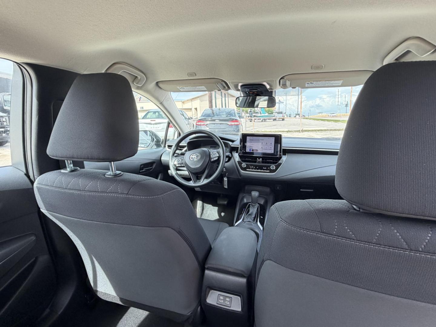 2024 White Toyota Corolla LE (5YFB4MDE8RP) with an 2.0L L4 DOHC 16V engine, CVT transmission, located at 1687 Business 35 S, New Braunfels, TX, 78130, (830) 625-7159, 29.655487, -98.051491 - Photo#5