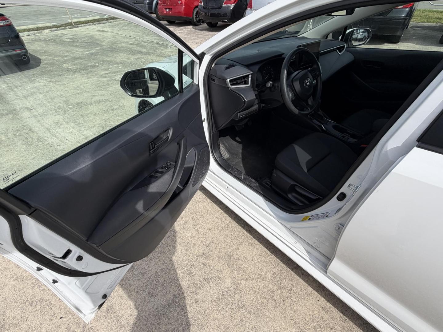 2024 White Toyota Corolla LE (5YFB4MDE8RP) with an 2.0L L4 DOHC 16V engine, CVT transmission, located at 1687 Business 35 S, New Braunfels, TX, 78130, (830) 625-7159, 29.655487, -98.051491 - Photo#9