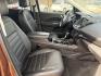 2017 Copper Ford Escape Titanium FWD (1FMCU0J9XHU) with an 2.0L L4 DOHC 16V engine, 6A transmission, located at 1687 Business 35 S, New Braunfels, TX, 78130, (830) 625-7159, 29.655487, -98.051491 - Photo#2