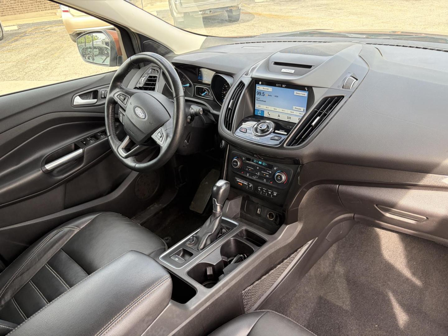 2017 Copper Ford Escape Titanium FWD (1FMCU0J9XHU) with an 2.0L L4 DOHC 16V engine, 6A transmission, located at 1687 Business 35 S, New Braunfels, TX, 78130, (830) 625-7159, 29.655487, -98.051491 - Photo#3