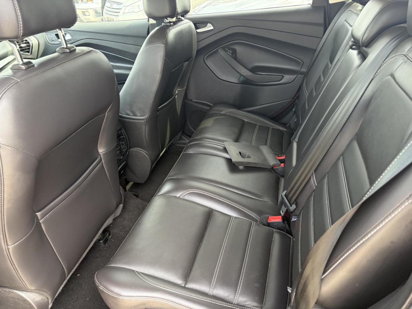 2017 Copper Ford Escape Titanium FWD (1FMCU0J9XHU) with an 2.0L L4 DOHC 16V engine, 6A transmission, located at 1687 Business 35 S, New Braunfels, TX, 78130, (830) 625-7159, 29.655487, -98.051491 - Photo#8