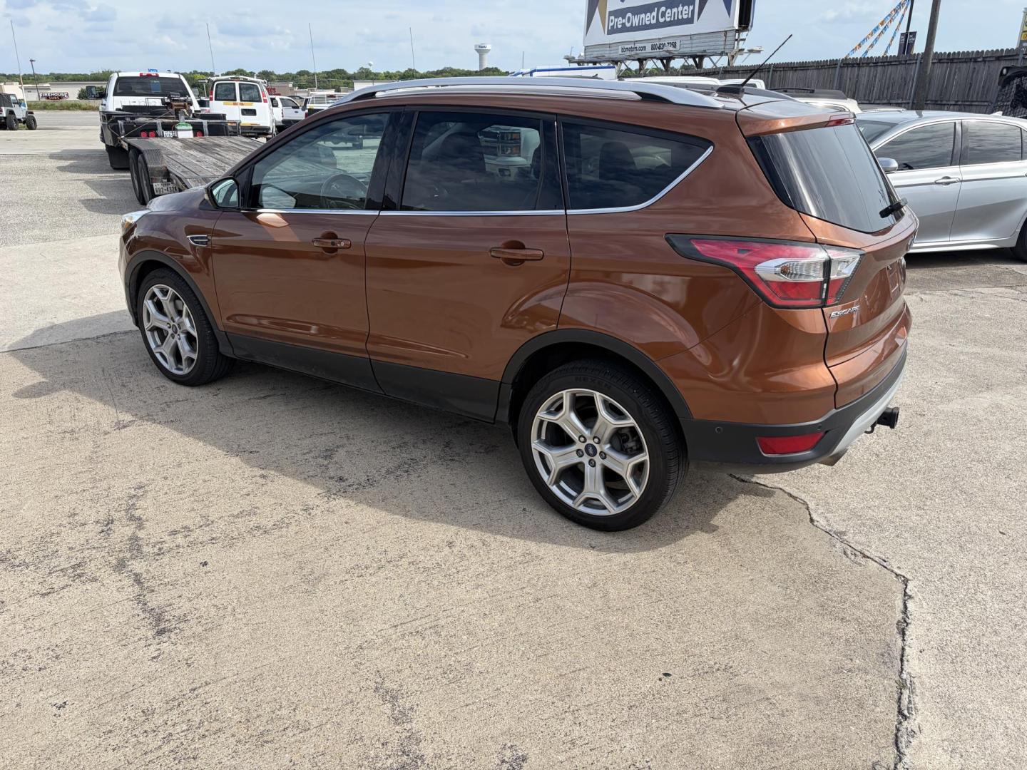 2017 Copper Ford Escape Titanium FWD (1FMCU0J9XHU) with an 2.0L L4 DOHC 16V engine, 6A transmission, located at 1687 Business 35 S, New Braunfels, TX, 78130, (830) 625-7159, 29.655487, -98.051491 - Photo#7