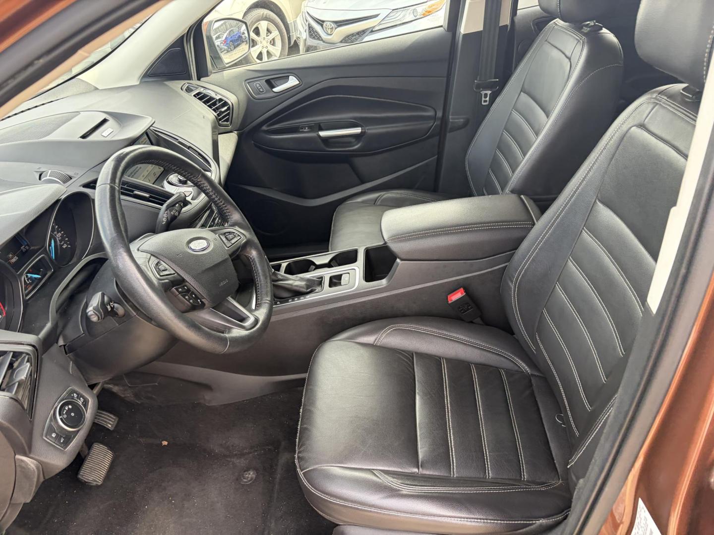2017 Copper Ford Escape Titanium FWD (1FMCU0J9XHU) with an 2.0L L4 DOHC 16V engine, 6A transmission, located at 1687 Business 35 S, New Braunfels, TX, 78130, (830) 625-7159, 29.655487, -98.051491 - Photo#10